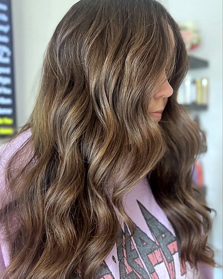 Warm bronde all-over color with dimensional lowlights